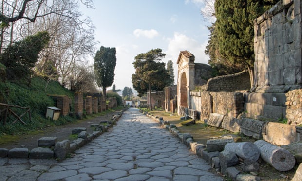 The Porta Ercolano suburb outside the northern wall of Pompeii. When the area was excavated, ancient rubbish was found piled in and around the tombs, houses, and shops.
