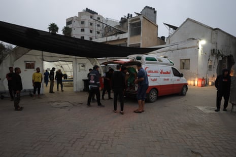 Palestinains, injured in Israeli attacks on a house in the Zeitoun neighbourhood, are brought to Al-Ahli Baptist hospital for treatment in Gaza City, on Thursday.