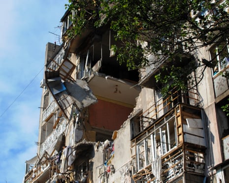 General view on damages from a Russian drone strike at a residential building in Odesa, Ukraine.