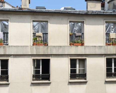 Parisians put reflective sheeting over windows in an attempt to beat the heat during a record-breaking heatwave in France.