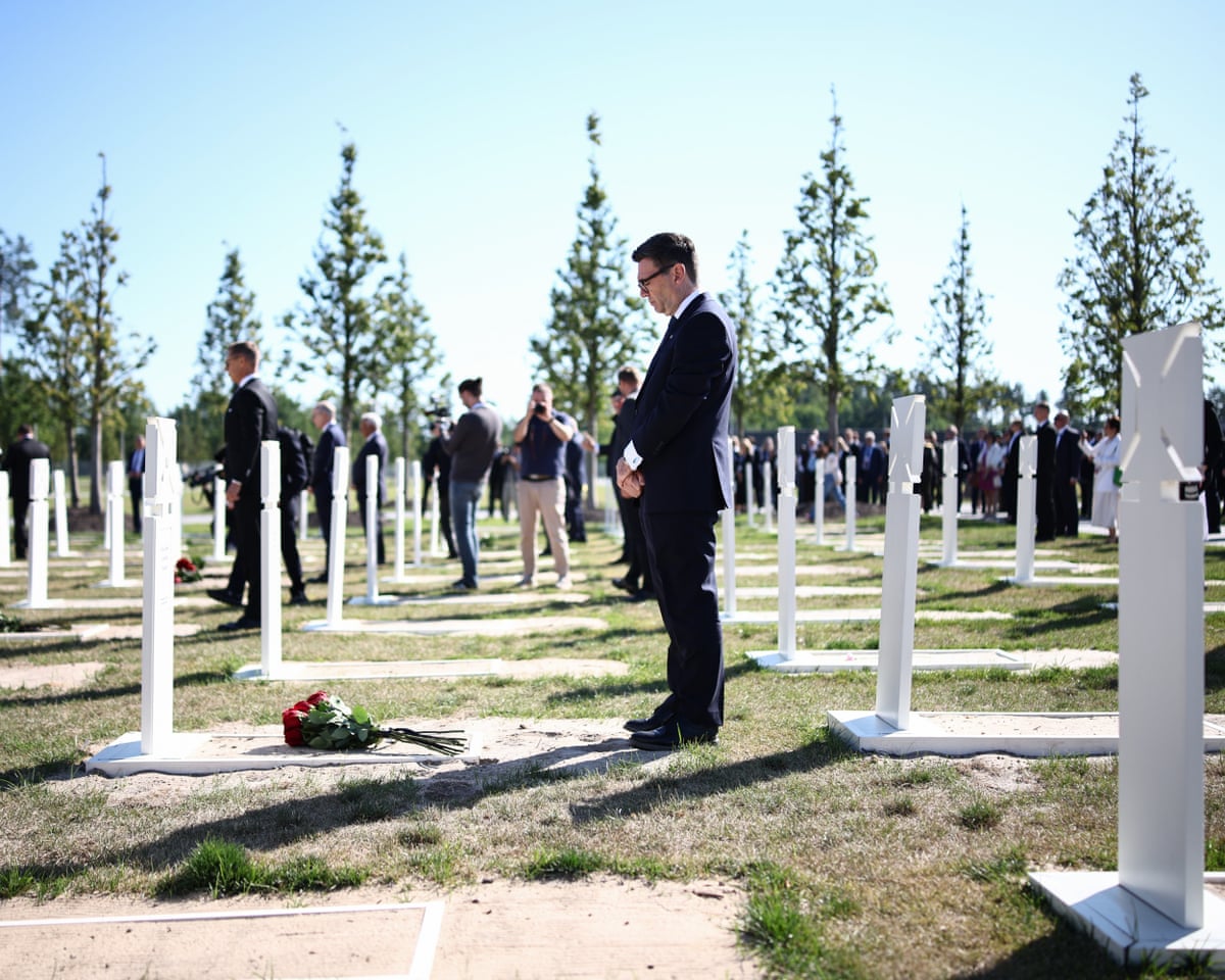 Britain's prime minister Andy Burnham attends a wreath-laying ceremony at the tomb of the unknown Ukrainian soldier at Ukraine's national military memorial cemetery in Hatne, southwest of Kyiv.