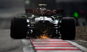 Lewis Hamilton’s Mercedes kicks up sparks at the Shanghai International circuit.