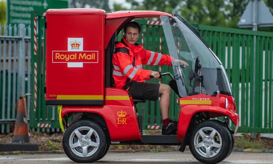 A Post Office employee operating an E-trike.