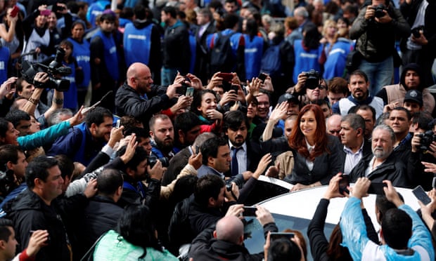 Cristina Fernández de Kirchner, in power from 2007 and 2015, waves to supporters after testifying about her alleged role in the central bank’s decision to sell dollars on the futures market at an artificially low price. 