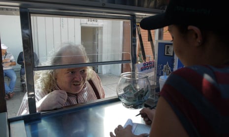 Jonathan Gold orders food from a taco truck.