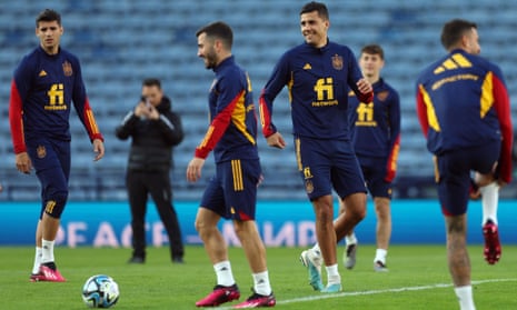 Rodri laughs during a training session at Hampden Park.