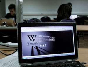 A reporter’s laptop shows the Wikipedia blacked out opening page in Brussels January 18, 2012. The blackout scheduled for Wednesday to protest against proposed legislation on online piracy has failed to get the support of the biggest Internet players. Despite calls for the participation of sites such as Facebook, Twitter and other big names, the biggest participants are the online encyclopedia Wikipedia and the social-news website Reddit. REUTERS/Yves Herman (BELGIUM - Tags: BUSINESS SCIENCE TECHNOLOGY CIVIL UNREST)