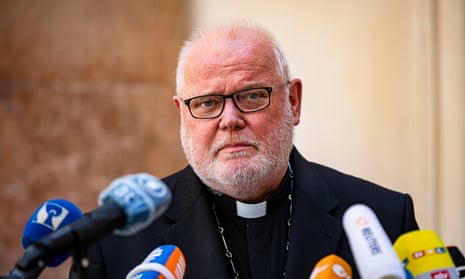 Cardinal Reinhard Marx speaks to the media in Munich about his offer of resignation