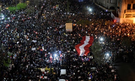 Demonstrators hold a protest against the new government of the interim president, Manuel Merino, at the San Martin square in Lima on Thursday, following the removal of former president MartÃn Vizcarra.