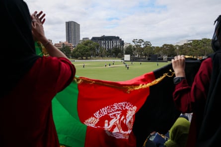 Supporters cheer for Afghanistan’s women in their T20 exhibition match.
