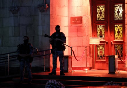 Officers stand guard at the Balzi Rossi restaurant