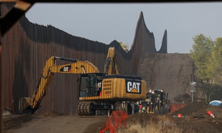 Work is done on a new border wall being constructed on 22 January in Jacumba, California.