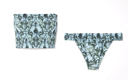 A Faithfull Elisa shirred printed recycled bikini top and Faithfull Tavira shirred printed recycled bikini briefs. The tropical pattern is light blue and shades of green