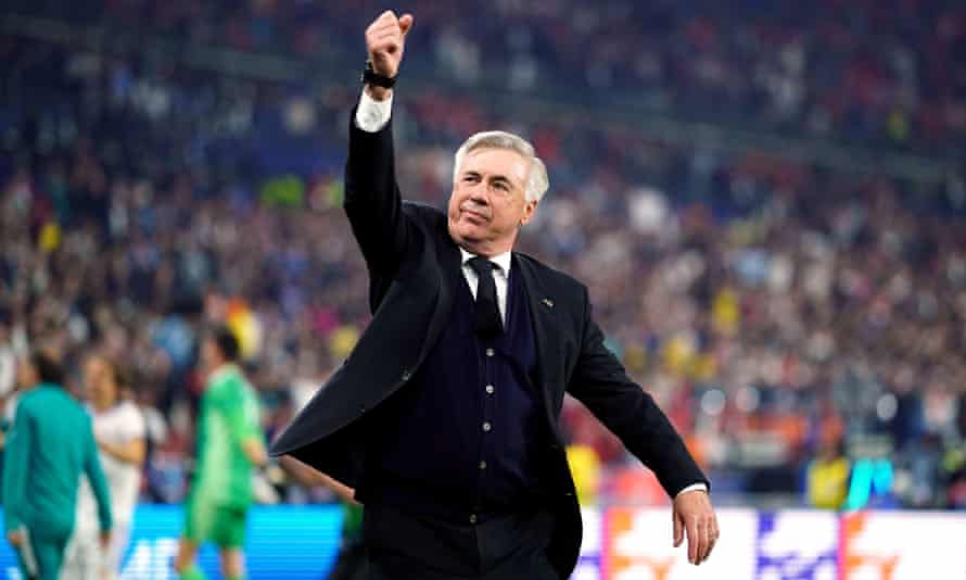 Carlo Ancelotti salutes the Real Madrid fans at the Stade de France