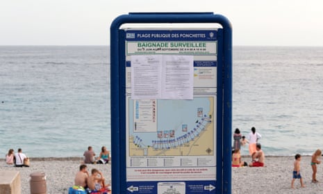 A sign at Ponchettes beach in Nice shows the law forbidding the wearing of clothing such as the burkini