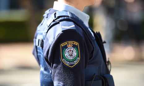 Woman allegedly spits and coughs on Sydney police officer sparking ...