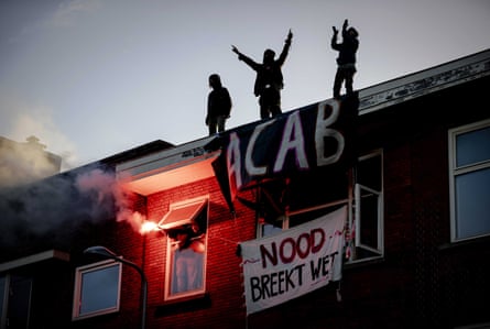 Activists demonstrate at a squatted building, demanding the government to intervene in the housing market and take measures for more affordable housing in Utrecht, Netherlands, 2021.