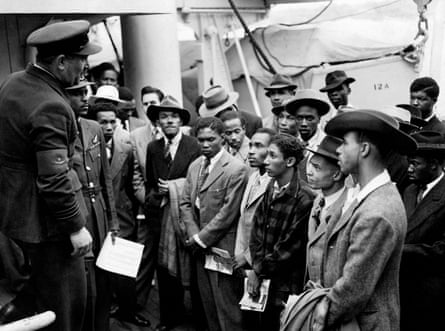 Jamaican immigrants being welcomed by RAF officials from the Colonial Office after the ex-troopship HMT Empire Windrush landed them at Tilbury.