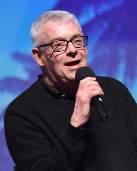 a man speaks into a microphone