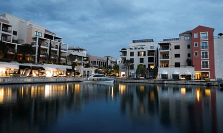 Buildings and a yacht are seen at Porto Montenegro marina in Tivat