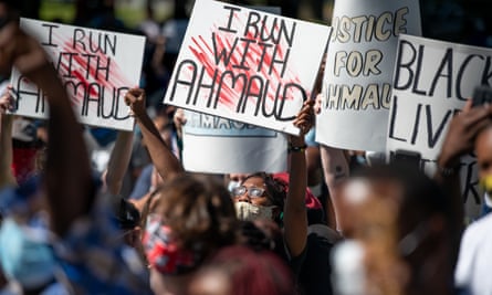 Demonstrators protest the shooting death of Ahmaud Arbery at the Glynn county courthouse on 8 May.