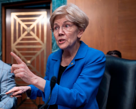 Elizabeth Warren, ranking member of the Senate banking committee, takes her seat in nomination hearing for Fed chair Kevin Warsh.