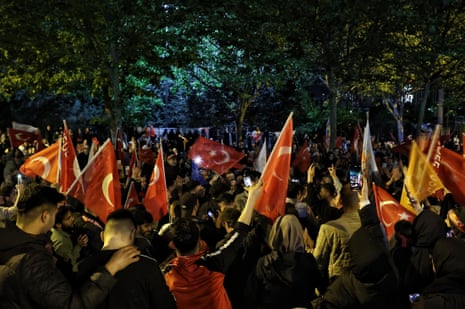 People attend a rally in front of AK party provincial presidency in Istanbul, Turkey.