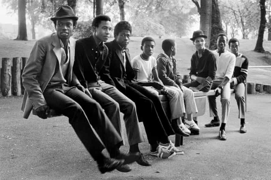 Young men on a swing in Handsworth Park, 1984.