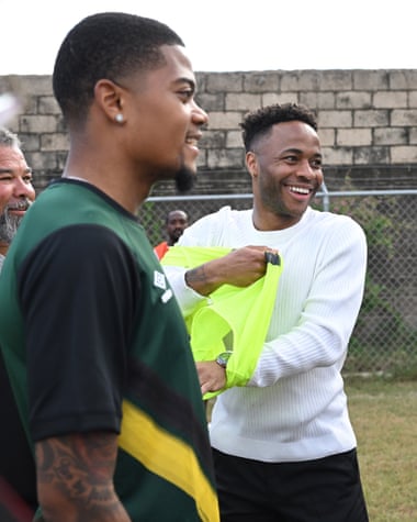Leon Bailey (left) and Raheem Sterling seen before the arrival of the Duke and Duchess of Cambridge in Trench Town during the royals’ visit to Kingston, Jamaica, in March.