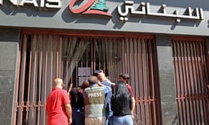 An angry depositor demanding access to his savings in Beirut