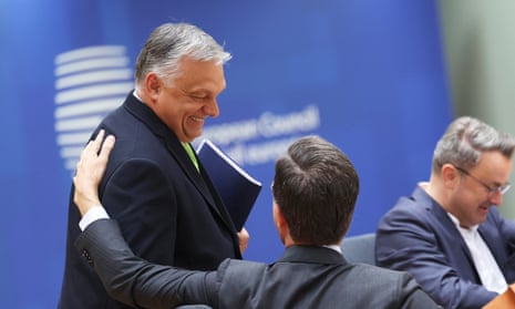 Hungary's Prime Minister Viktor Orban, left, speaks with Netherland's Prime Minister Mark Rutte during a round table meeting at the European Council building in Brussels in 2023.