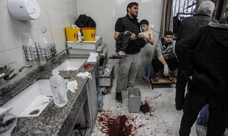 Palestinians wounded in Israeli attacks, including children, at Nasser hospital in Khan Younis on Monday.
