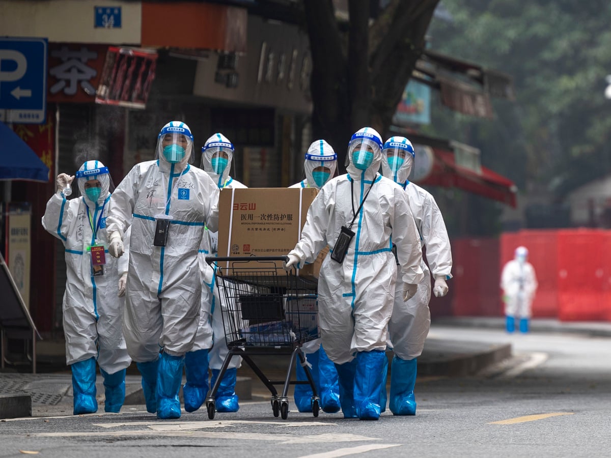 China eases Covid rules but insists 'war' against pandemic will continue | China | The Guardian