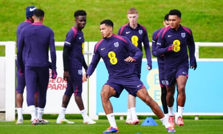 Levi Colwill runs drills alongside his England teammates St George’s Park