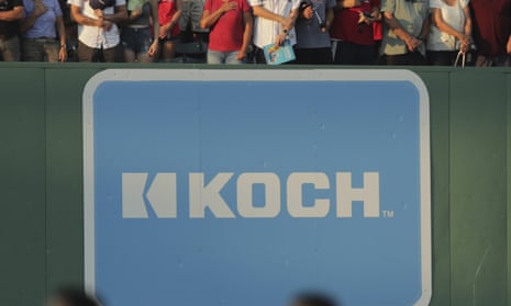 A sign advertising Koch Industries is seen in Boston in 2019. 
