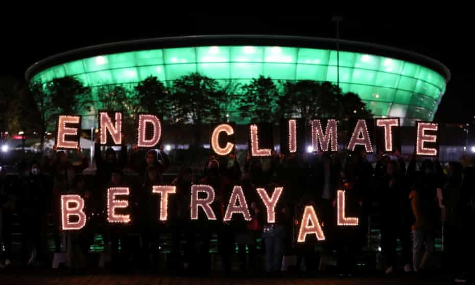 Climate youth activists protest opposite the venue for COP26 in Glasgow.