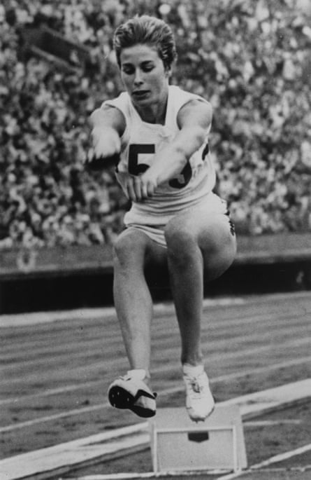 Mary Rand makes a long jump at the 1964 Tokyo Olympic Games