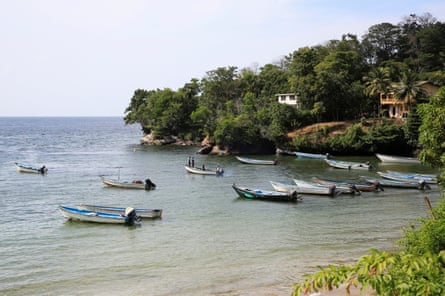 boats are anchored in a bay