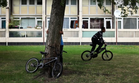 Children play on a housing estate in Tower Hamlets.