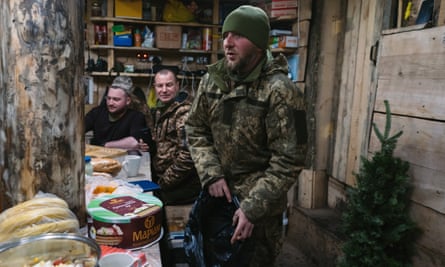 Ukrainian soldiers prepare to celebrate new year in the Sumy trenches.