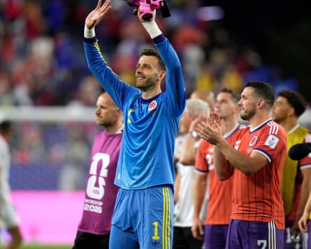 Angus Gunn and John McGinn salute a jubilant Scottish crowd after beating Haiti 1-0