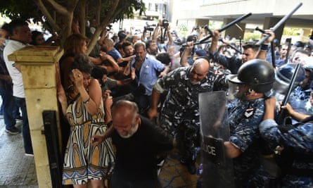 Relatives of the victims of Beirut Port blast gather in front of the house of Lebanon’s Interior Minister, Mohammad Fahmi during a protest demanding the fair conduct of the investigation for the explosion in the Port of Beirut.