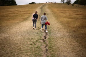 People avoid cracks appearing along paths on Primrose Hill.