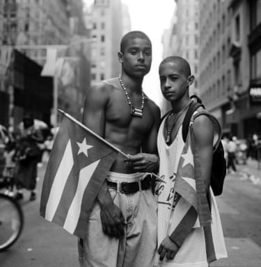 two men holding a flag