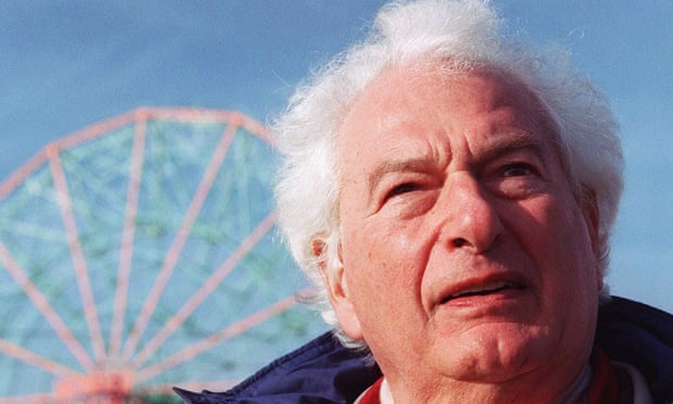 Joseph Heller … happily laughing at his own jokes.