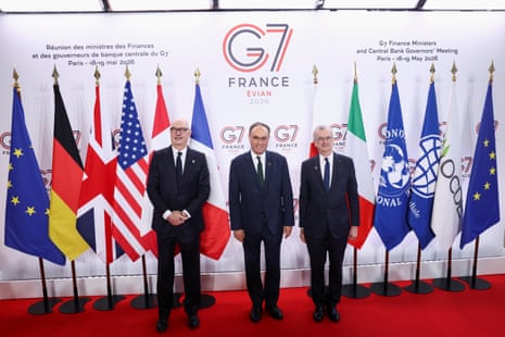 Lescure and Villeroy de Galhau also posed with governor of the Bank of England Andrew Bailey.