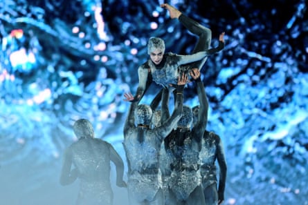 Dancers perform during the closing ceremony of the Winter Olympics at the Verona Arena.