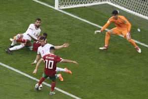 Younes Belhandaâs shot is blocked.