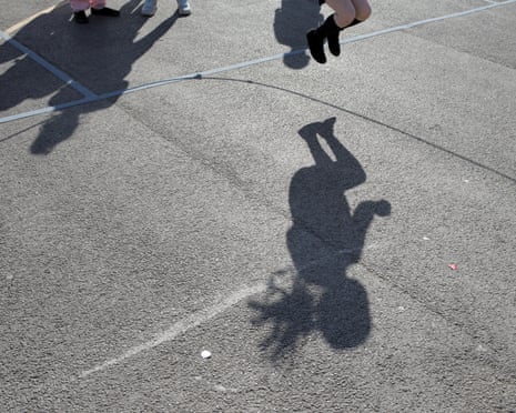 Pupils skipping during playtime at Red Hall Junior School in Darlington, County Durham