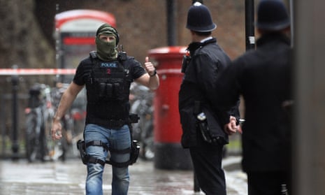 An armed officer in London.